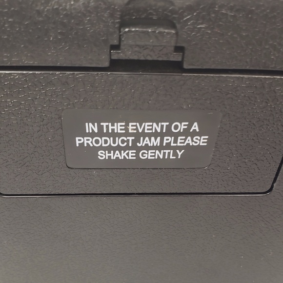 Yellow M&M on Black La-Z-Boy Dispenser - Picture 4 of 9